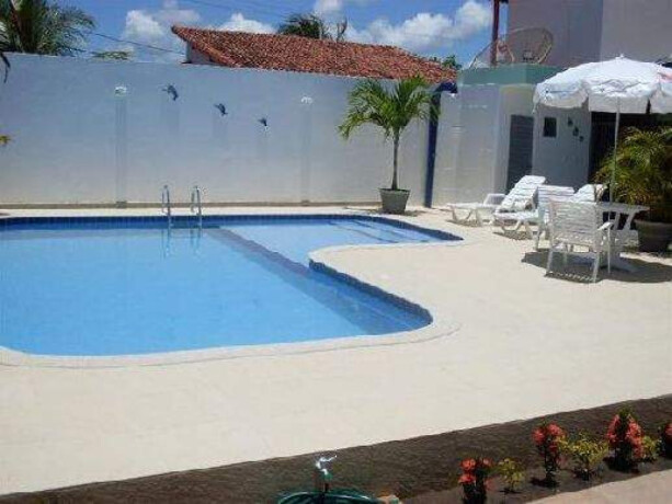 casa-de-temporada-em-guarajuba-camacari-bahia-guarajuba-proxima-ao-centro-casa-44-sendo-02-suites-com-ar-piscina-e-churrasqueira-big-0